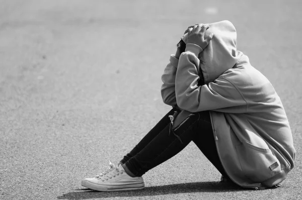 Nervous Girl Sitting on Street — Stock Photo, Image