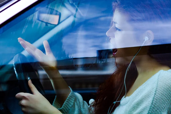 Angry Woman Driving a Car