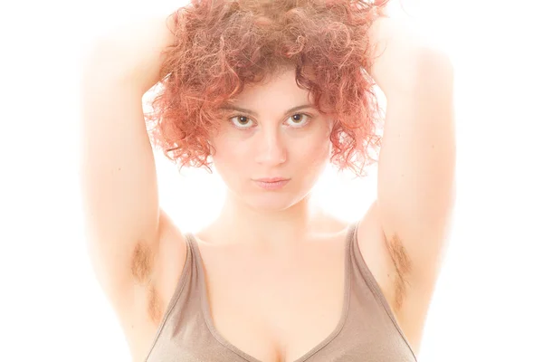 Woman with Hairy Armpits - Stock Image. 
