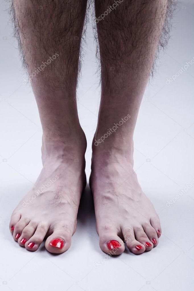 Man's Feet with Red Nail Polish