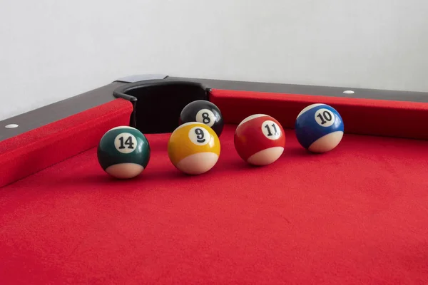 Billiard balls on a pool table. Billiard pool table, red cloth.