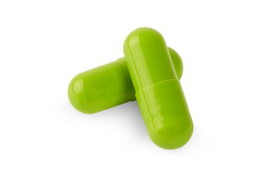 Beyaz arkaplanda izole edilmiş kapsüller