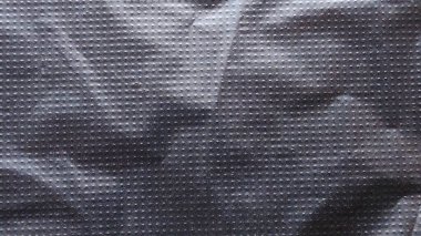 Buruşmuş Siyah Plastik veya Kumaş Doku Doku Deseni ve Dramatik Gölge Ayrıntıları ile Özet