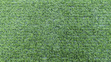Kusursuz Manikürlü Yapay Çimen Arkaplanı: Spor ve Peyzaj İçin Canlı Yeşil Sentetik Çimen DokusuName