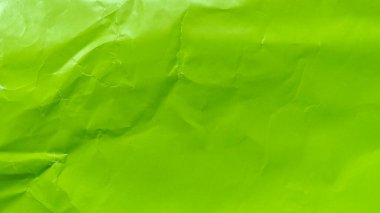 Canlı kireç yeşili kağıt dokusu organik kırışıklıklar ve ince yüzey kıvrımlarıyla