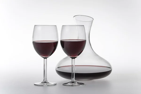 Red wine in decanter and glasses — Stock Photo, Image