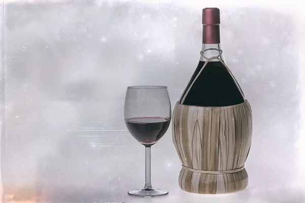 Old bottle of chianti wine — Stock Photo, Image