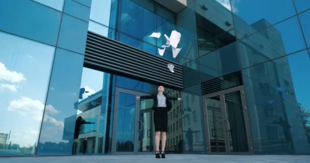 Successful young woman lawyer leaves courtroom or office, celebrates victory, won case, throws documents and papers away, confidently loosens her hair feeling relief, walks gracefully through city — Stock Video