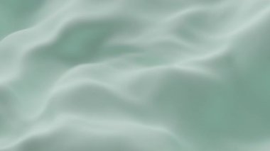 Yumuşak nane yeşili ipek kumaş yumuşak dalgalar oluşturarak zarif minimum arkaplan dokusu yaratarak tazeliği, sakinliği ve tasarım, video veya dekor temaları için lüks estetiği sembolize eder.