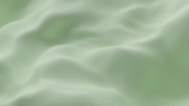 Yumuşak yeşil ipek kumaş yumuşak dalgalar oluşturarak zarif minimum arkaplan dokusu yaratarak tazeliği, sakinliği ve tasarım, video veya dekor için lüks estetiği sembolize eder.