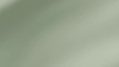 Yumuşak bilge yeşil kumaş yumuşak hareket ederek doğal kıvrımlı sakin, zarif, minimal arkaplan dokusu yaratıyor. Tasarım, video veya dekorasyon için estetik ideali gevşetiyor.