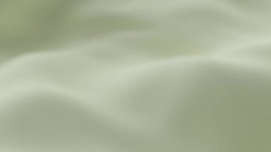 Yumuşak bej ipek kumaş yumuşak dalgalar oluşturarak zarif minimum arkaplan dokusu yaratarak tazeliği, sakinliği ve tasarım videosu veya dekor temaları için lüks estetiği sembolize eder.