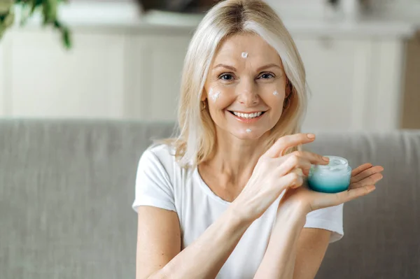 anti-aging woman caucasian beauty skin care face cream