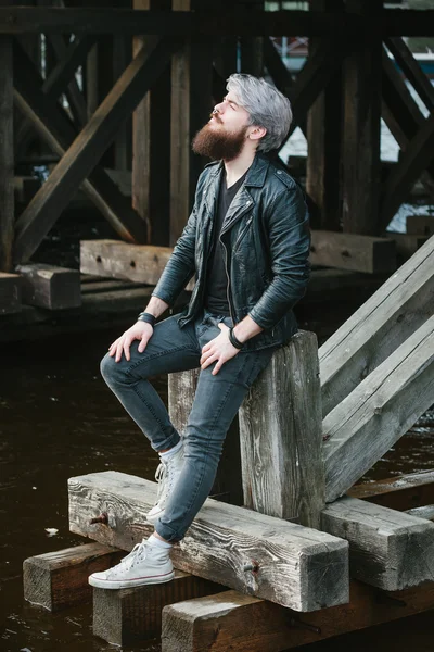 Bearded hipster with nose ring in leather jacket — Stok fotoğraf