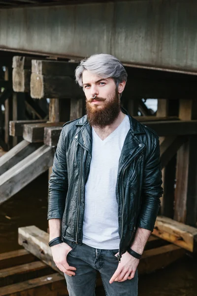 Bearded hipster with nose ring in leather jacket — Stock Photo, Image