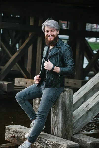 Bearded hipster with nose ring in leather jacket — Stok fotoğraf