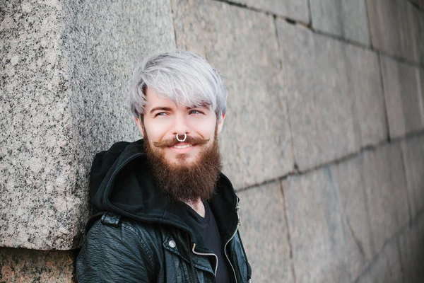 Bearded hipster with nose ring in leather jacket — Stock Photo, Image