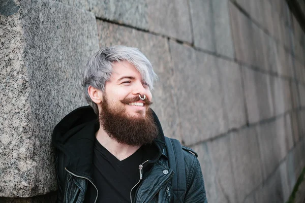 Bearded hipster with nose ring in leather jacket — Stock Photo, Image