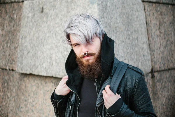 Bearded hipster with nose ring in leather jacket — Stok fotoğraf