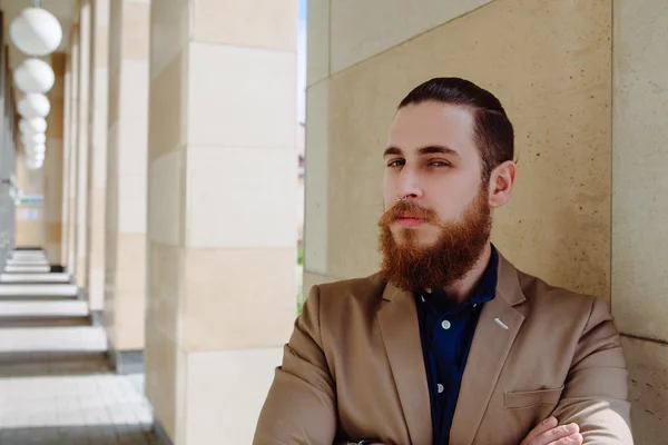 Bearded hipster wearing shirt in the city — Stok fotoğraf