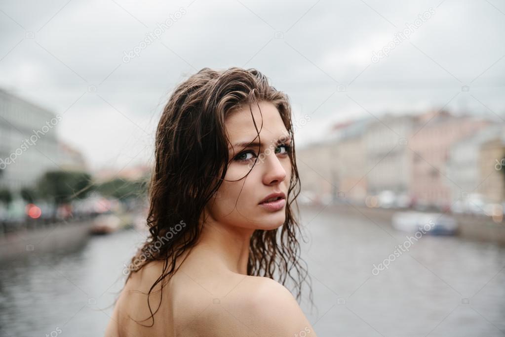 Natural female beauty in summer rain