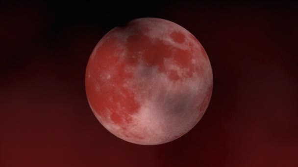 Pleine lune rouge et nuages mouvants 