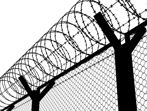 Fence with a barbed wire — Stock Photo, Image