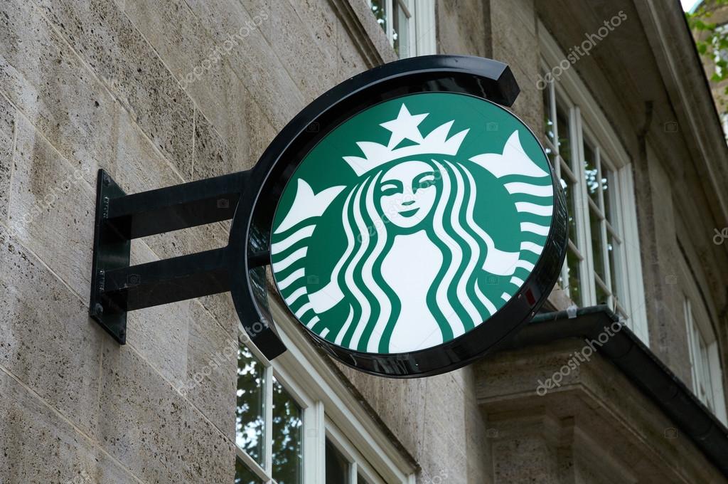 HAMBURG, GERMANY - AUGUST 14, 2015: Starbucks Coffee logo light box, Starbucks is the largest coffeehouse company in the world