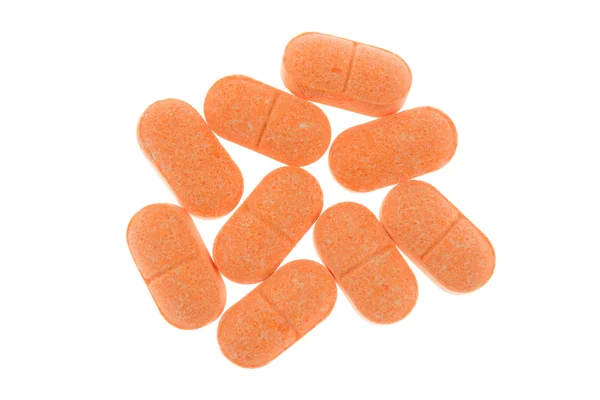 C vitamini hapları üzerinde beyaz — Stok fotoğraf