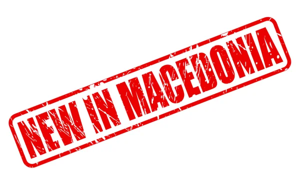Nieuwe In Macedonië rode stempel tekst — Stockvector