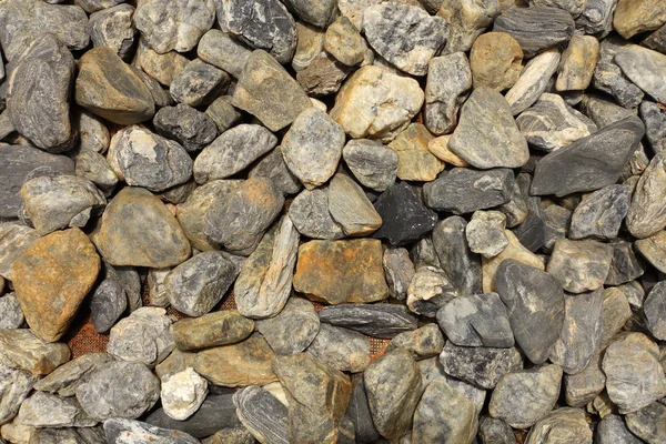 Piedra gris triturada en la textura del suelo —  Fotos de Stock