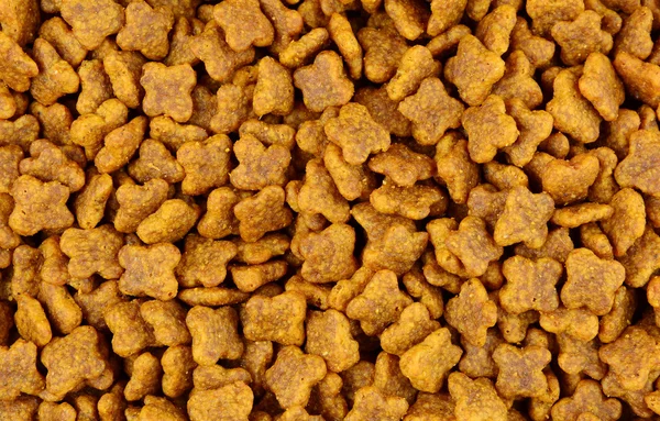 Close up of brown dog food — Stock Photo, Image