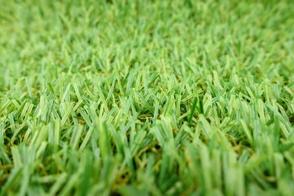 Closeup του πεδίου τεχνητή χόρτο — Φωτογραφία Αρχείου