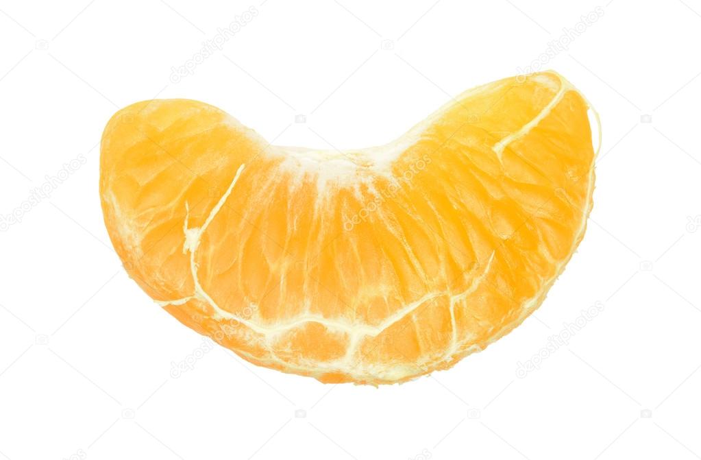 Close up of orange fruit slice on white