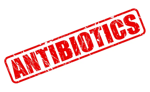 Antibiotika červené razítko text — Stockový vektor