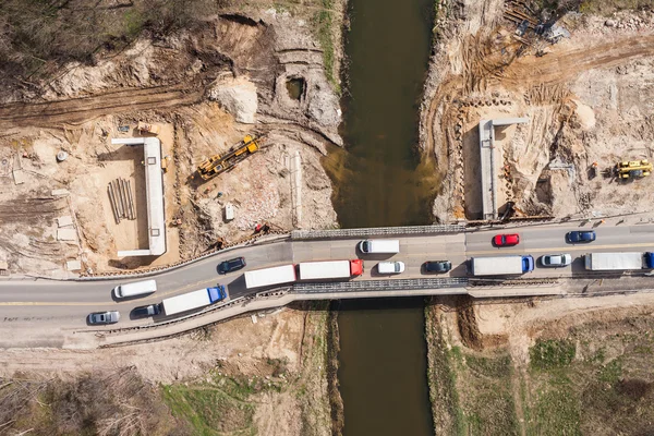 Aerial view of the  rier and bridge building site — Stock Photo, Image