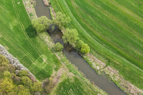 Small river and the harvest field — Stock Photo, Image