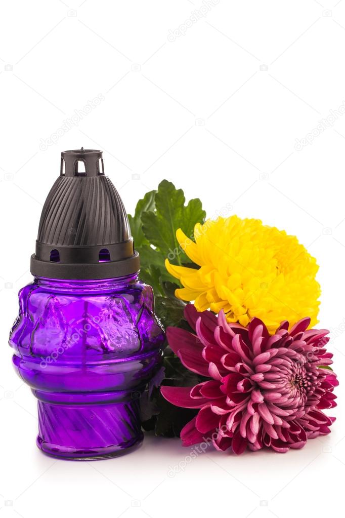 Grave candle  lantern with flowers  isolated on white