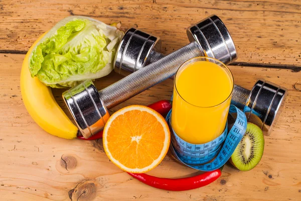 Fitnessapparatuur en gezonde voeding — Stockfoto