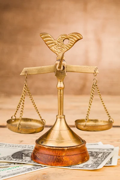 Scales of justice and dollars money — Stock Photo, Image