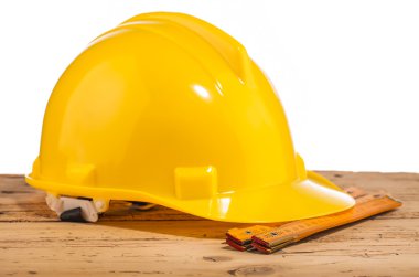 Sarı kask ve ölçme aracı