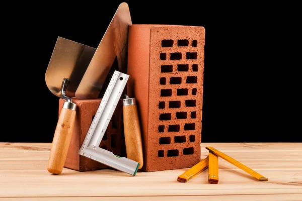 Bouwer tools en bakstenen — Stockfoto