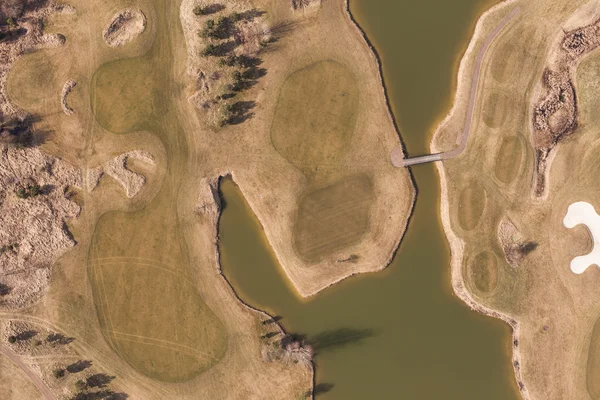 Aerial view over golf field bridge — Stock Photo, Image