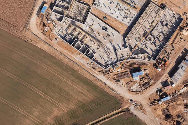 Vista aérea del sitio de construcción y campos de cosecha —  Fotos de Stock