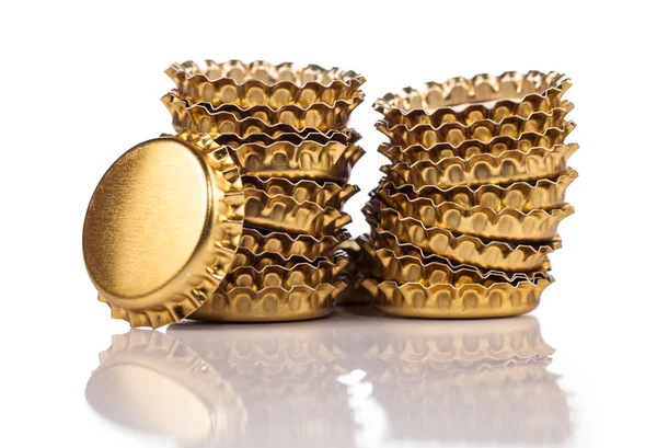 Goldene Kronkorken — Stockfoto