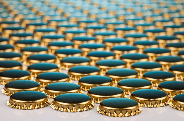 Golden bottle caps — Stock Photo, Image