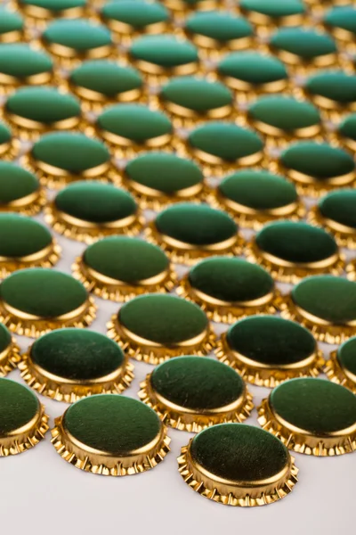 Golden bottle caps — Stock Photo, Image