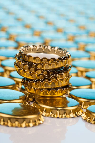 Golden bottle caps — Stock Photo, Image