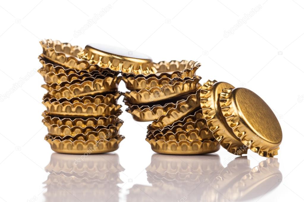 Golden bottle caps — Stock Photo © yeti88 69092753