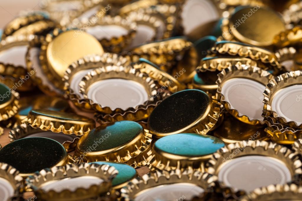 Golden bottle caps Stock Photo by ©yeti88 69093737